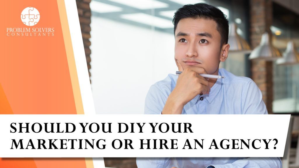 A man holding a pen looks thoughtful, with text: "Should you DIY your marketing or hire an agency?" and the Problem Solvers Consultants logo in the top left corner.